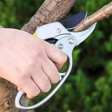 Pruning shears tool resting on garden deck showing sturdy construction