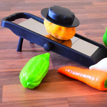 Adjustable vegetable slicer with stainless steel blades for kitchen use.