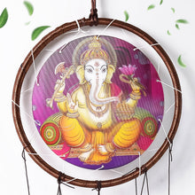 Side view of Lord Ganesh Wind Chimes hanging outdoors