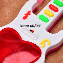 A detailed shot of the musical toy guitar's buttons and colorful lights.