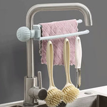 Faucet-mounted hanging rack for towels and cleaning sponges