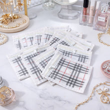 Clear zipper pouches to organize rings and chains in jewellery organizer kit