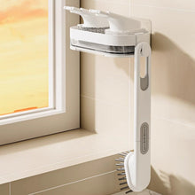 Cleaning brush and tray organiser mounted on wall for sink cleaning