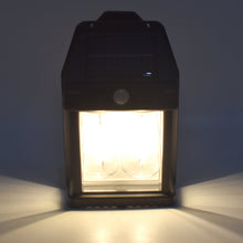 Waterproof plastic solar wall light mounted on exterior wall