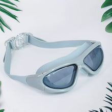 Anti-fog coated polycarbonate lenses on swimming goggles