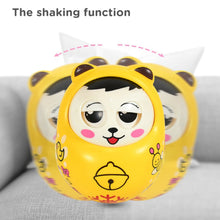 Close-up of the adorable animal face on the musical roly poly toy