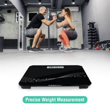 Top-down view of digital personal weight scale highlighting smooth tempered glass design