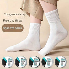 Packaged portable disposable socks, highlighting their compact size.