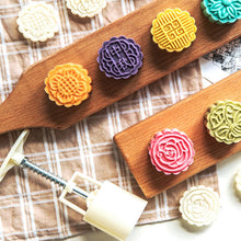Mooncake Press Mold kit showing 4 interchangeable floral stamps for detailed baking