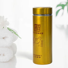 Compact 300ml Vacuum Water Bottle in grey, perfect for daily commutes and travel, shown on a table.