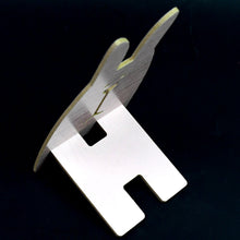 Close-up of the wooden rabbit mobile stand's detail and craftsmanship.