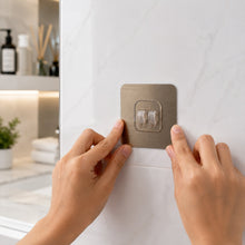 Self-adhesive plastic hook for organizing spaces