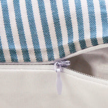 Close-up showcasing the elegant leather accent on a pillow cover
