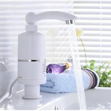 Close-up view of electric water heater faucet head with temperature control