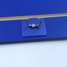 High-definition phone screen magnifier displaying a vibrant, enlarged image.