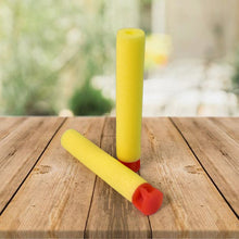 Close-up of a single soft foam blaster dart with a round head.
