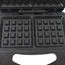 Close-up of the cool-touch handle and indicator lights on the Dabster sandwich maker.
