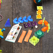 Magnetic marble run components including magnetic tiles and marbles