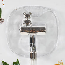 Multi-purpose plastic self adhesive wall hooks attached to cabinet
