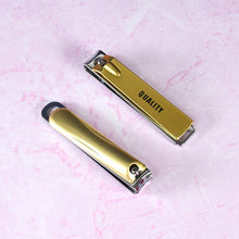 Lifestyle shot of the portable nail clippers on a travel essentials tray, ready for use.