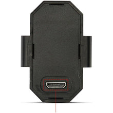 Mini LED strobe light securely mounted on a bicycle wheel, enhancing night-time visibility.