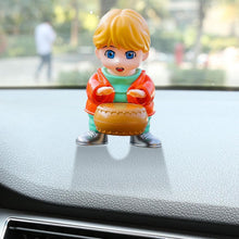 Creative solar car air freshener displaying its compact and innovative design.