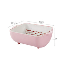 Stackable BPA-free plastic strainer and outer bowl for compact storage.