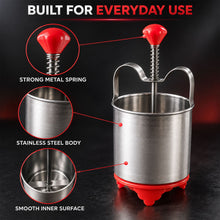 A stainless steel medu vada maker with red accents, highlighting its strong metal spring, stainless steel body, and smooth