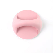 Plastic adhesive handle grip attached on a drawer
