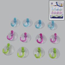 Clear transparent suction hooks displayed neatly for easy home organization.