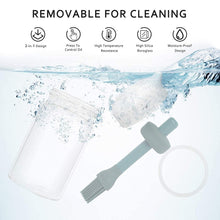 Ergonomic oil brush dispenser for precise application during grilling or baking.