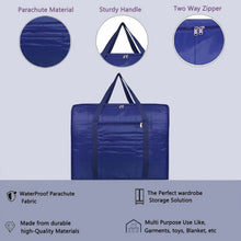 Blanket organizer storage bag featuring reinforced carrying handles