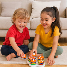 White base learning board with colorful geometric stacking shapes for toddlers