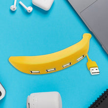 Wiregenix Banana Shape USB Hub in use with a laptop, expanding available ports easily.