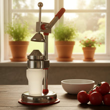 Manual citrus juicer side view showing compact design