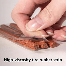 A close-up of a hand peeling back clear plastic from brown high-viscosity tire rubber strips.