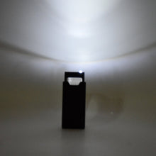 Side view of extendable LED magnifier with durable ABS body