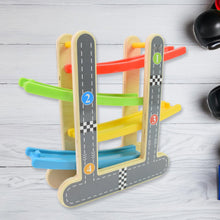 Close-up of the smooth wooden ramps and vibrant mini cars of the play set.