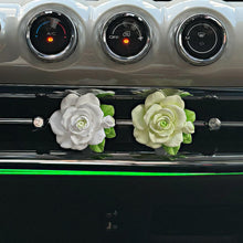 Close-up flower petal details on floral car air freshener clip