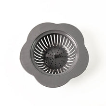 Flower-patterned plastic kitchen sink strainer for trapping debris
