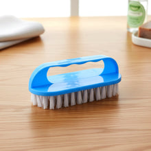 Ergonomic scrub brush handle designed for comfortable daily household cleaning.