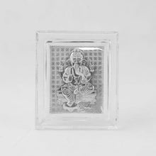 Front view of a silver-plated Ganesha idol in a clear acrylic frame on a plain white background.