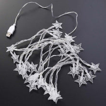 Festive USB powered star string LED lights creating warm ambiance