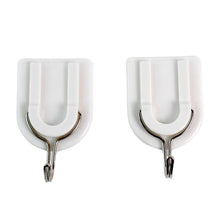 Bathroom organization with an adhesive hook securely holding a towel.