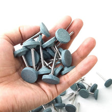 Various rotary tool accessories including the Grinding Head Mounted Stone set.