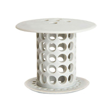 Flexible silicone sink and tub hair catcher strainer in use
