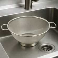 Side profile of stainless steel strainer colander with comfortable handles