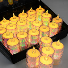 Twenty-four lit LED tea lights with colorful, shimmering bases and bright yellow tops in a black box.