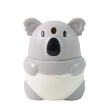 Side perspective of koala toothpick dispenser for hygienic toothpick access