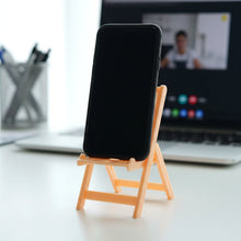 Adjustable smartphone holder styled as a mini chair stand